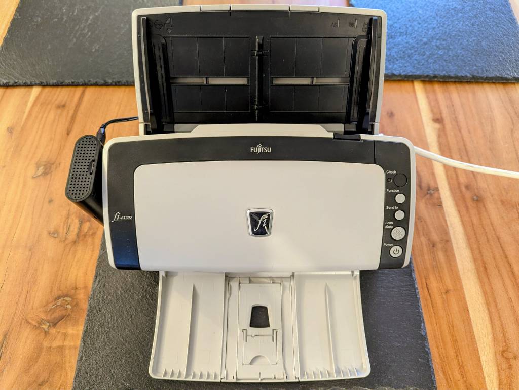 Fujitsu fi-6130Z Document Scanner with Raspberry PI attached to the side with Velcro